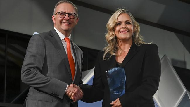 Prime Minister Anthony Albanese presents the award for 2023 Australian of the Year to SA Australian of the Year, to Taryn Brumfitt. Picture: Martin Ollman/Getty Images