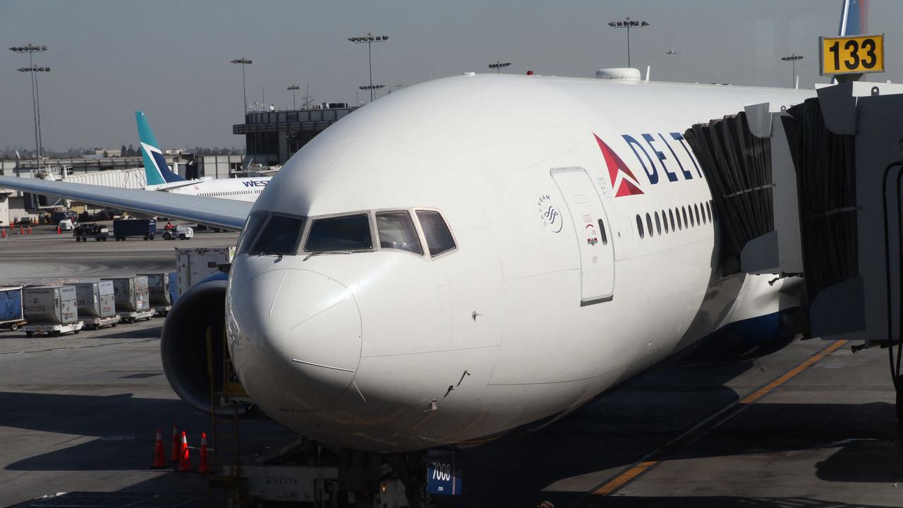 From November, unvaccinated employees on Delta Air Lines’ account-based healthcare plan will get hit with a $A276.50 monthly surcharge. Picture: Daniel Slim/AFP