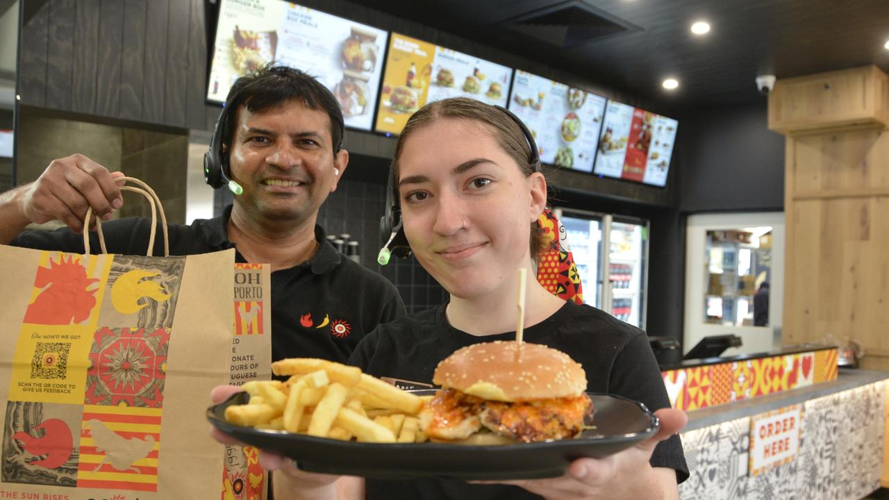 NOW OPEN: Celebrating the launch of Oporto's first drive-through restaurant in Toowoomba are (from left) franchisee Reddy Goguri and employee Amber Scofield.