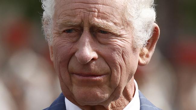 (FILES) Britain's King Charles III looks on during an official welcoming ceremony at the Arc de Triomphe in Paris on September 20, 2023, on the first day of a state visit to France. Britain's King Charles III has been diagnosed with a "form of cancer" according to a statement released by Buckingham Palace on February 5, 2024. (Photo by Yoan VALAT / POOL / AFP)