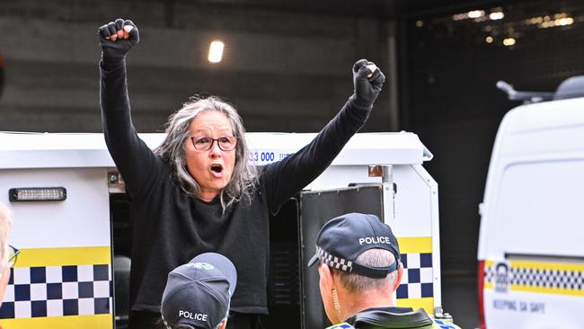 Extinction Rebellion protestor Meme Thorne is arrested after disrupting Adelaide traffic. Picture: NCA NewsWire / Brenton Edwards