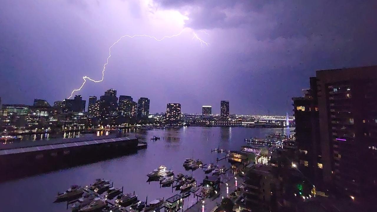 Lightning lights up Docklands during wild and stormy December weather. Picture: Megan Kertes/Supplied