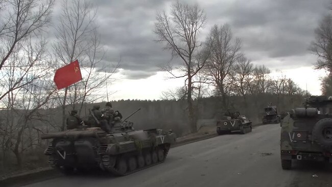 Russian soldiers have been filmed taunting Ukrainians with the Soviet Union flag. Picture: YouTube