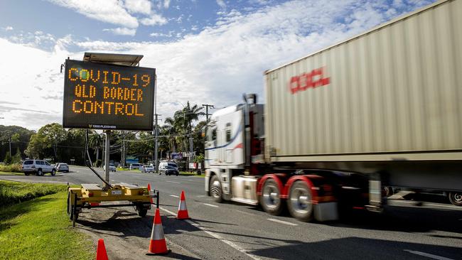 A road sign warning motorists of the COVID-19 QLD Border  control  by Queensland police enforcing the QLD state border closer  due to Coronavirus (COVID-19) and   checking  drivers  as they cross from NSW to QLD at Gold Coast Highway at Bilinga. .   Picture: Jerad Williams