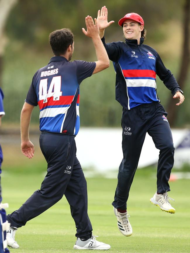 Premier: Footscray bowler Tim Hughes celebrates a wicket. Picture: Stuart Milligan