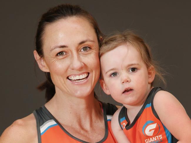 Picture is on hold not for use without permission. EMBARGOED - SATURDAY TELEGRAPH ONLYPictured at Homebush in Sydney is Giants netball defender Bec Bulley with her 2 year old  daughter Indie. Only two women in the Australian netball league have children but Bec manages to balance motherhood with professional sport.Picture: Richard Dobson