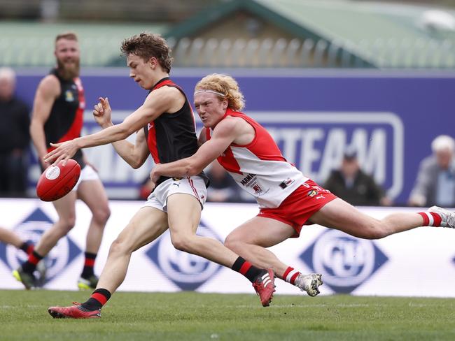 North Launceston's Michael Stingel is tackled by Clarence's Ethan Jackson. Picture: Zak Simmonds