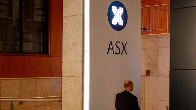 SYDNEY, AUSTRALIA - NewsWire Photos, October 29 2024. GENERIC. Stocks. Finance. Economy. A security guard in the lobby of the ASX Australian Stock Exchange on Bridge Street. Picture: NewsWire / Max Mason-Hubers