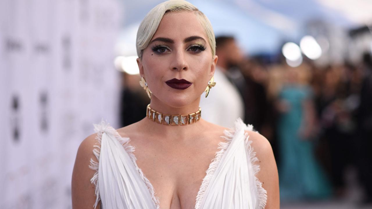 Lady Gaga walks the red carpet at the 25th Annual Screen Actors Guild Awards at the Shrine Auditorium in Los Angeles. (Photo by Robyn Beck / AFP)