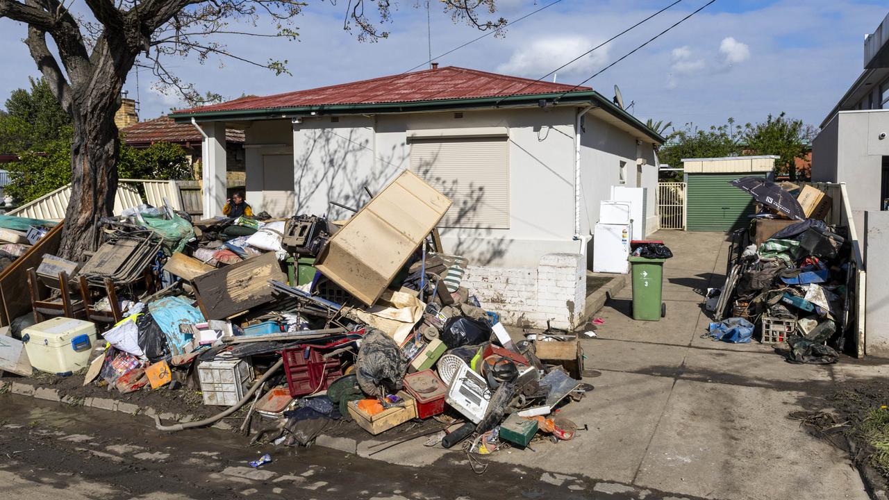 Piles of flood-damaged furniture line Clyde St in Maribyrnong after recent flooding. Picture: NCA NewsWire / Aaron Francis