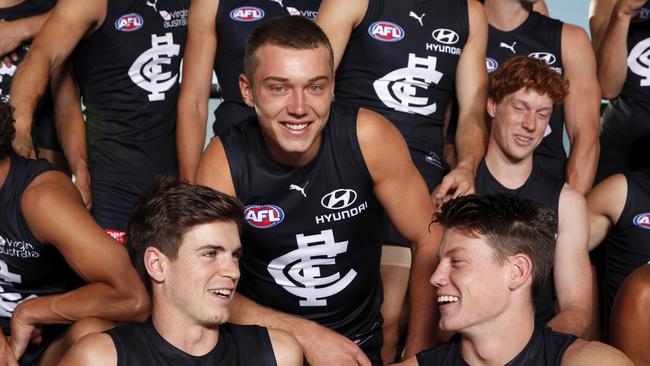 Patrick Cripps on team photo day with youngsters Paddy Dow and Sam Walsh. Picture: AFL Photos