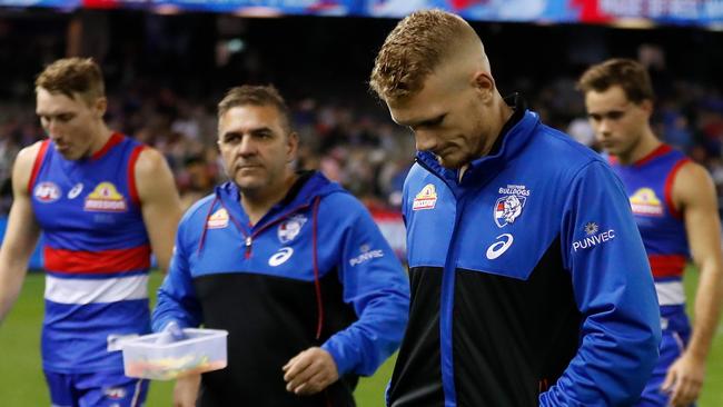 MELBOURNE, AUSTRALIA - MAY 22: Adam Treloar of the Bulldogs looks on with a moon-boot during the 2021 AFL Round 10 match between the Western Bulldogs and the St Kilda Saints at Marvel Stadium on May 22, 2021 in Melbourne, Australia. (Photo by Michael Willson/AFL Photos via Getty Images)