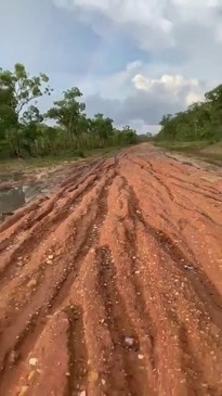 Flood damaged road between Cape York cattle stations Harkness and Balurga