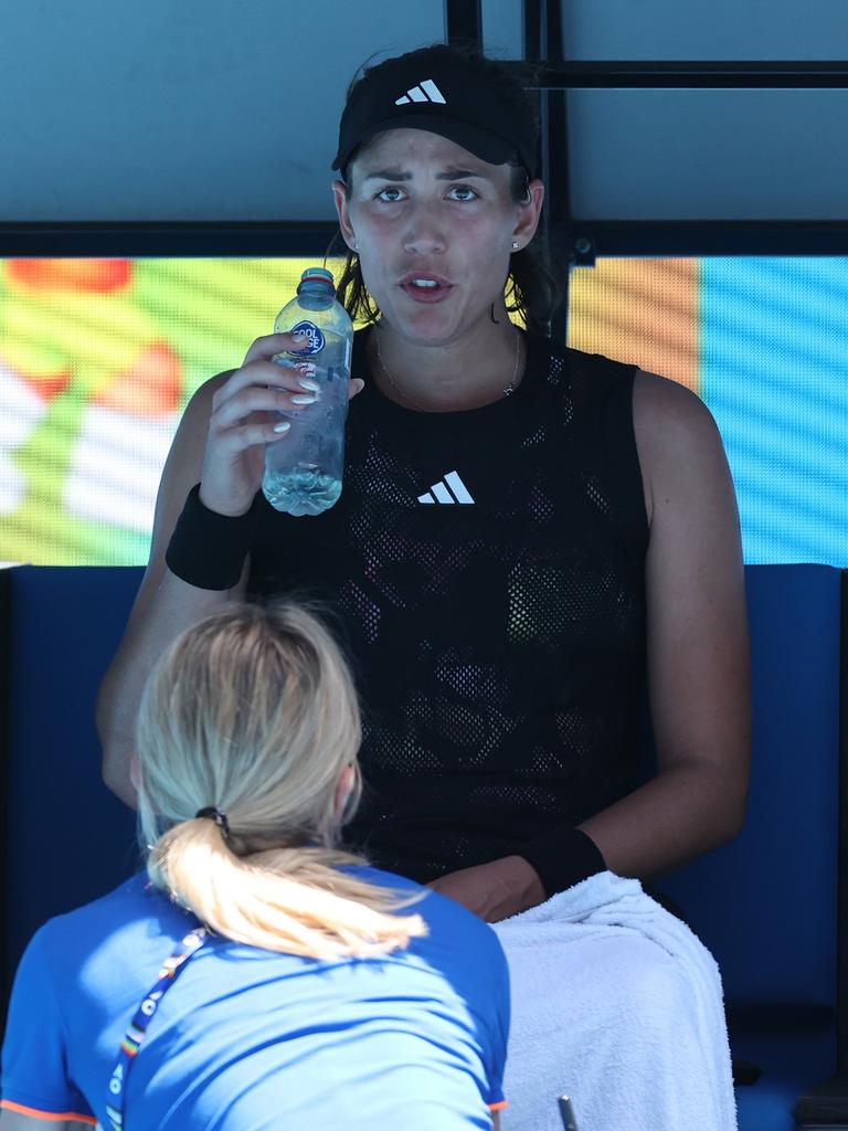 Spanish player Garbine Muguruza was forced to take a medical time-out during her first round match against Belgian star Elise Mertens as she struggled with the heat on Tuesday morning. Picture: Getty Images