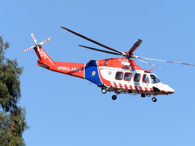 MELBOURNE, AUSTRALIA - NewsWire Photos SEPTEMBER 15, 2020: An Air Ambulance transports a man shot by police after an incident on Hutchinson St Lilydale. It is believed the man lunging at officers with a knife. Picture: NCA NewsWire / Andrew Henshaw