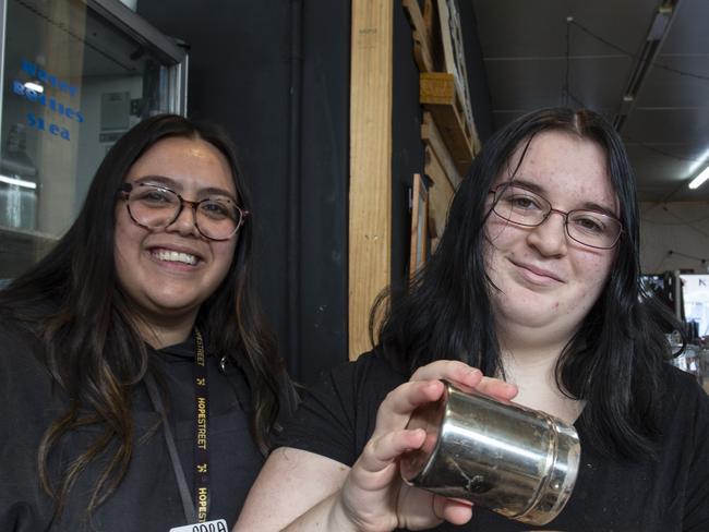 Careworks runs a youth program at its Davoren Park site which includes teaching young people skills such as hospitality and coffee making. Youth Worker Sara Carbone (left) teaches  Volunteer Ash Childs the art of coffee making. 4th July 2024. Picture: Brett Hartwig