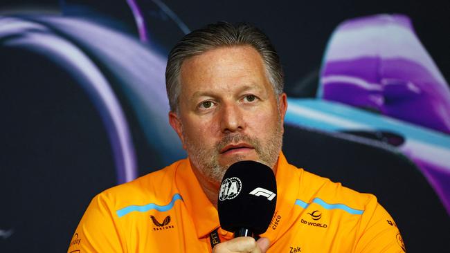 Zak Brown with the Daniel Ricciardo backhander. Photo: Clive Rose/Getty Images/AFP