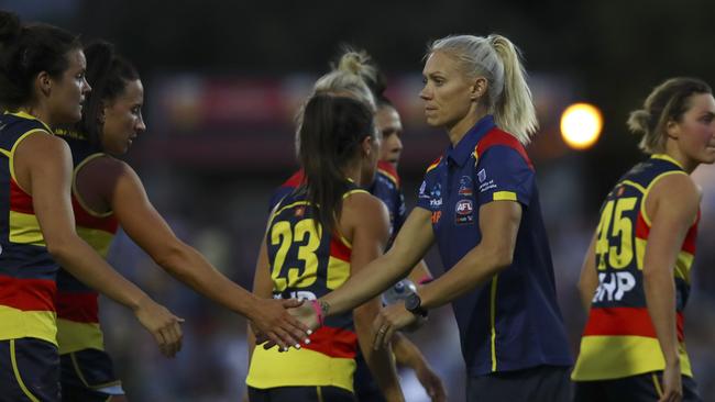 Erin Phillips with her teammates after being ruled out of Round 1.  Picture: Sarah Reed