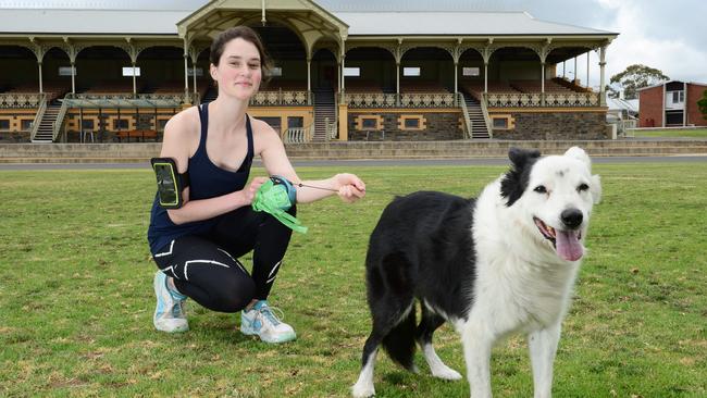 Ena Winter, 18, with her border collie, Ollie, at Victoria Park. Picture: Michael Marschall