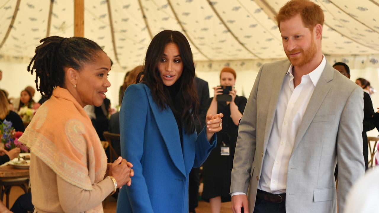 Meghan’s mother Doria Ragland, above with the royal couple last September, is awaiting the birth with her daughter at Frogmore House, Windsor. Picture: Ben Stansall/WPA Pool/Getty Images. 