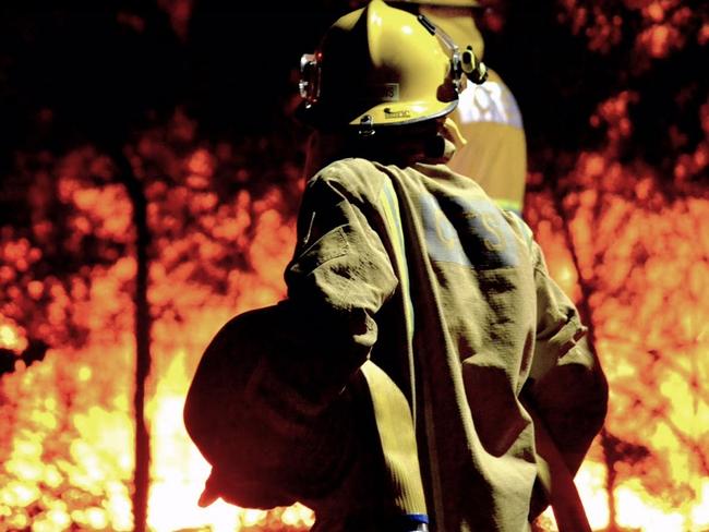 Generic photo of CFS fire fighter and flames