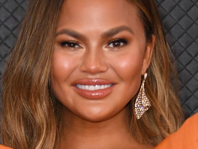 US model Chrissy Teigen arrives for the 62nd Annual Grammy Awards on January 26, 2020, in Los Angeles. (Photo by VALERIE MACON / AFP)