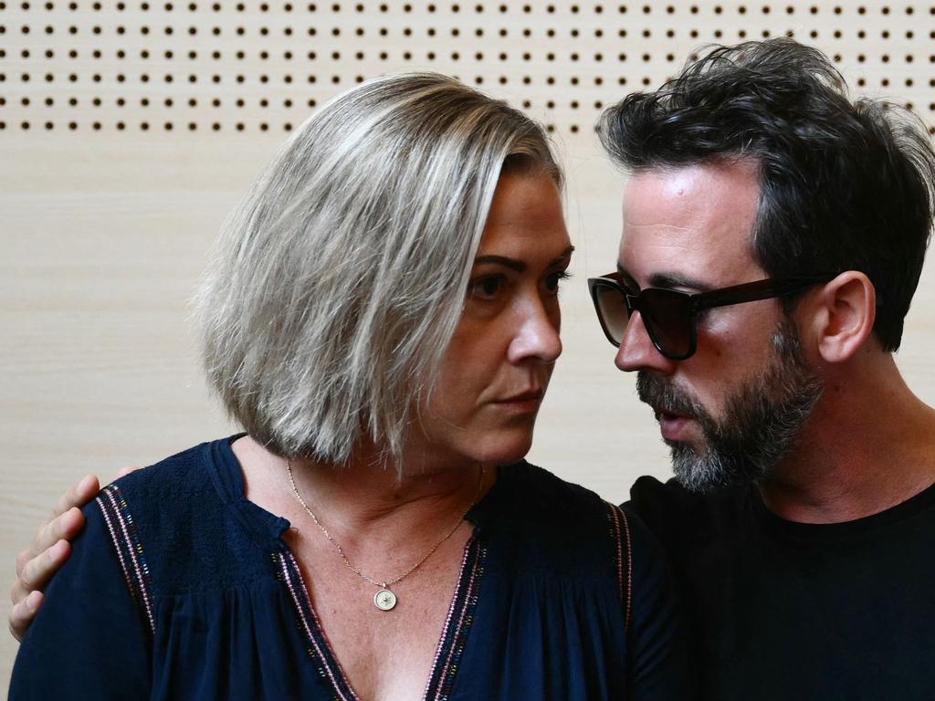 Caroline Darian (L) stands next to her brother Florian P. , at the courthouse during the trial of their father accused of drugging their mother for nearly ten years. Picture: Christophe SIMON / AFP