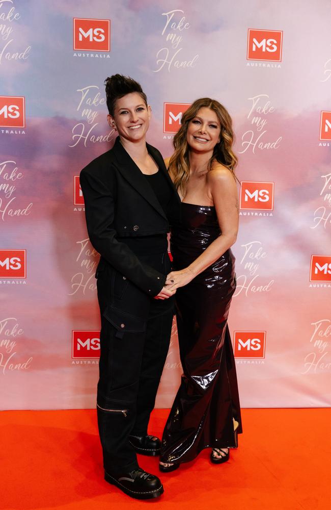 Natalie Bassingthwaighte and partner Pip Loth made their red carpet debut together at the Take My Hand Premiere in Sydney. Picture: Supplied