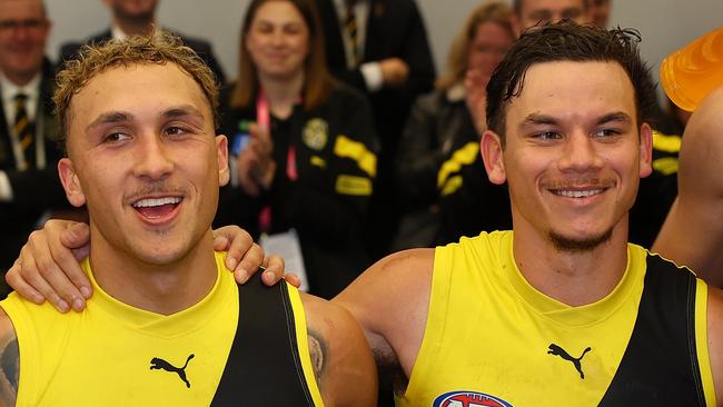 PERTH, AUSTRALIA - JUNE 10: Marlion Pickett, Shai Bolton and Daniel Rioli of the Tigers sing their club song after winning the round 13 AFL match between Fremantle Dockers and Richmond Tigers at Optus Stadium, on June 10, 2023, in Perth, Australia. (Photo by Paul Kane/Getty Images)