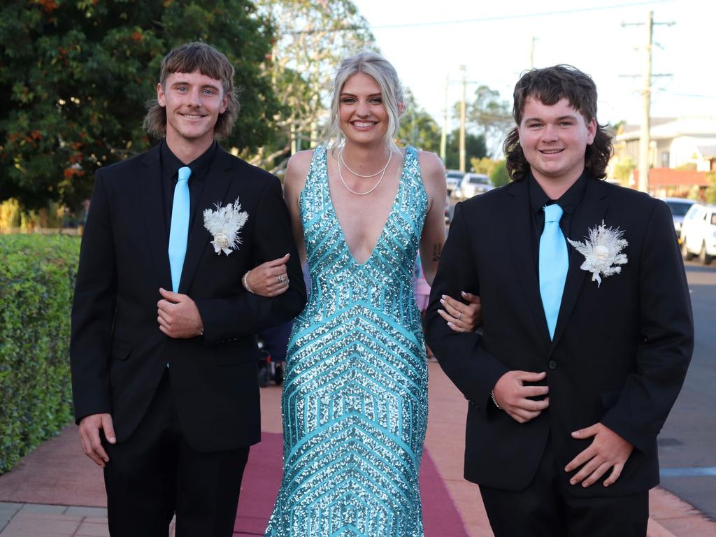 Tyler De Martin, Maycee O’Donnell and Harley Chapman at the 2023 Isis State High School formal. Image credit: Isis SHS.