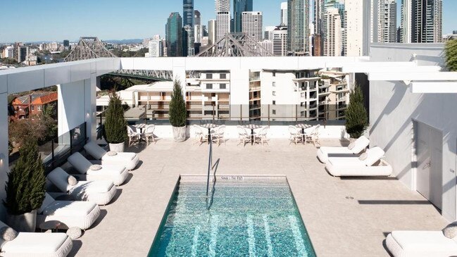 The sun is out at Hotel X's rooftop pool.