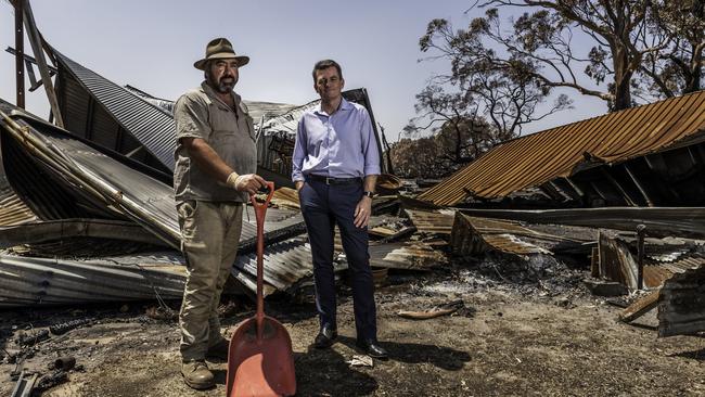 Leader of the National Bushfire Recovery Agency, Andrew Colvin, with Kangaroo Island farmer Sam Mumford. Picture: Sean McGowan