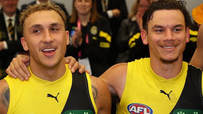 PERTH, AUSTRALIA - JUNE 10: Marlion Pickett, Shai Bolton and Daniel Rioli of the Tigers sing their club song after winning the round 13 AFL match between Fremantle Dockers and Richmond Tigers at Optus Stadium, on June 10, 2023, in Perth, Australia. (Photo by Paul Kane/Getty Images)