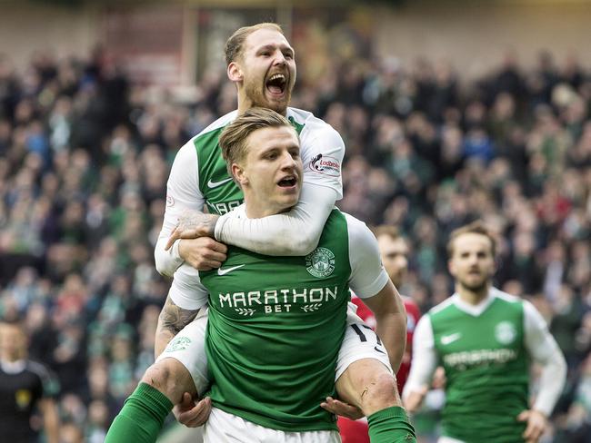 Cummings and Boyle celebrate a goal against Ayr United for Hibernian in 2017. Picture: Bruce Whit/SNS Group via Getty Images