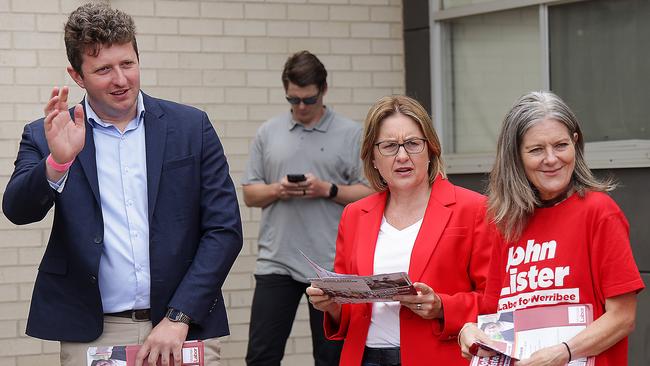 Premier Jacinta Allan and Labor candidate John Lister greet voters at the polling booth at Manor Lakes P-12 College. Picture: Ian Currie.