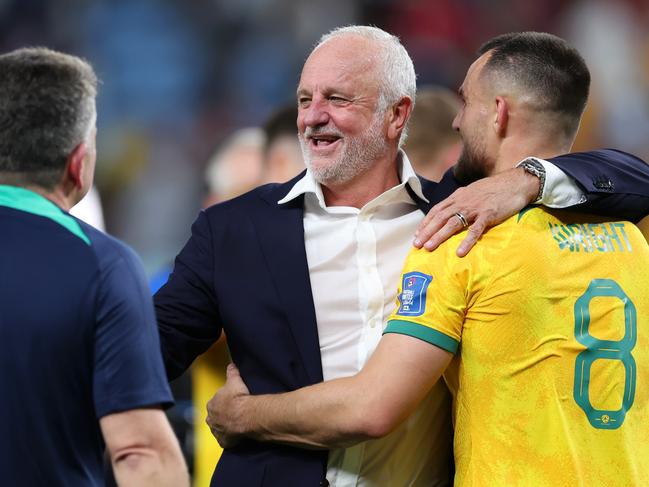 Graham Arnold shares a moment with Bailey Wright after their 1-0 victory over Denmark. Picture: Alex Grimm/Getty Images