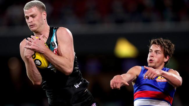 Peter Ladhams has been excellent since coming into the side. Now, he faces a long stint on the sidelines. Picture: James Elsby/AFL Photos