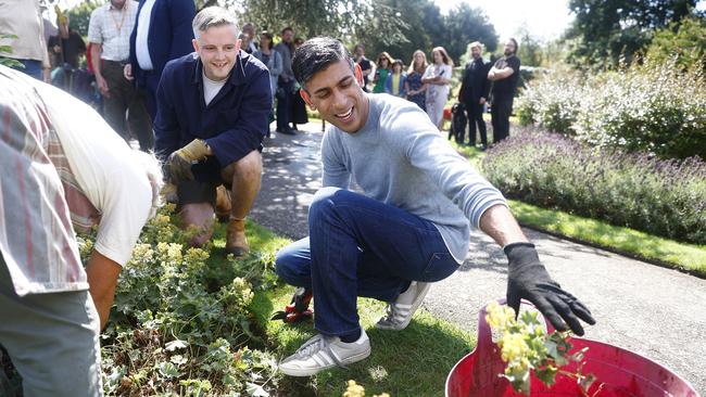 Rishi Sunak does a spot of gardening in a park in Bexley, England, at the weekend. Picture: Getty Images