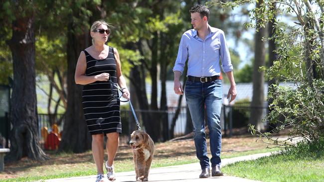 Members of the Friends of Glenhaven Group Lisa Manton, with her dog Minnie, and Mitchell Blue. After a spike in the number of break-ins of homes and cars in Glenhaven members of the Friends of Glenhaven Group are calling for CCTV and security patrols. Picture: AAP IMAGE / Robert Pozo