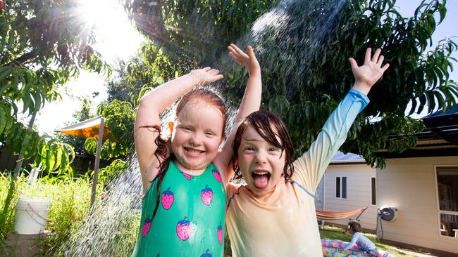 Cooling off in Port Willunga are twins Reuben and Maisy 6. Picture: Brett Hartwig