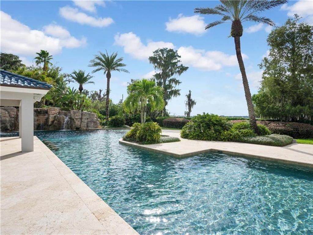 The lavish pool and rock waterfall. Picture: Realtor