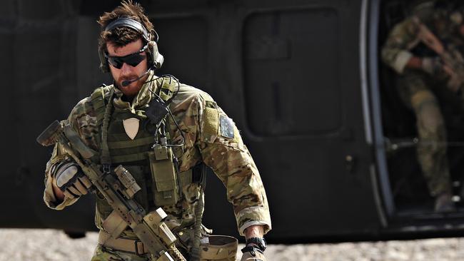 Ben Roberts-Smith, with the Australian Special Operations Task Group, leaves a UH-60 Blackhawk helicopter during preparation of the Shah Wali Kot offensive in Afghanistan in 2010. Picture: ADF