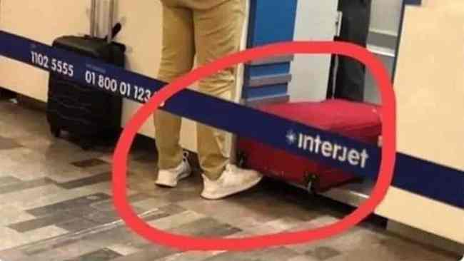 Male Passenger Using Baggage Check Weighing Machine at Airport