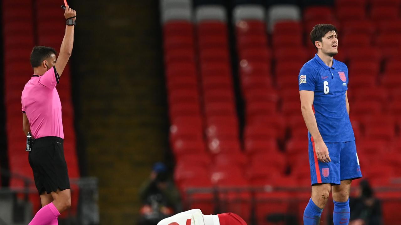 England's defender Harry Maguire is red carded. (Photo by DANIEL LEAL-OLIVAS / POOL / AFP)