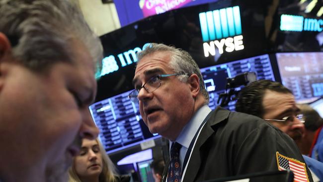 Traders on the floor of the New York Stock Exchange on Friday..