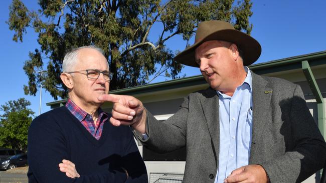 Prime Minister Malcolm Turnbull with the LNP candidate for Longman, Trevor Ruthenberg at the Caboolture Sports Football Club on Saturday.