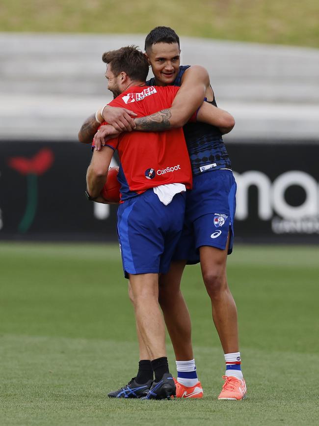 Jamarra Ugle-Hagan hugs assistant coach Jarryn Geary. Picture: Michael Klein