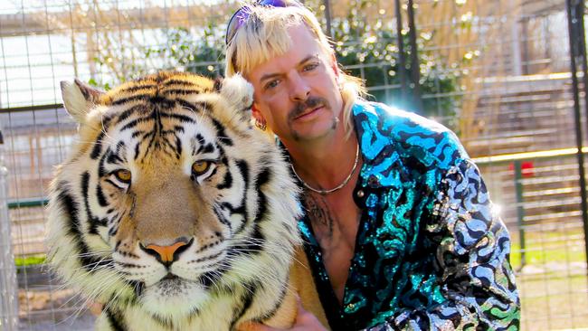 Joseph ‘Joe Exotic’ Maldonado-Passage with one of his cats in Netflix’s Tiger King.