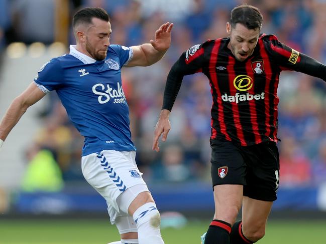 LIVERPOOL, ENGLAND - OCTOBER 07: Jack Harrison of Everton battles for possession with Adam Smith of AFC Bournemouth  during the Premier League match between Everton FC and AFC Bournemouth at Goodison Park on October 07, 2023 in Liverpool, England. (Photo by Nathan Stirk/Getty Images)