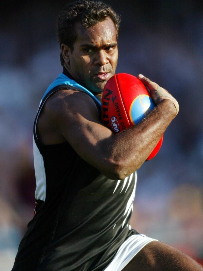 Byron Pickett in action for Port Adelaide during the 2004 AFL grand final.